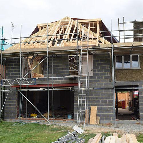 2 storey extension with double hipped roof and dormer windows
